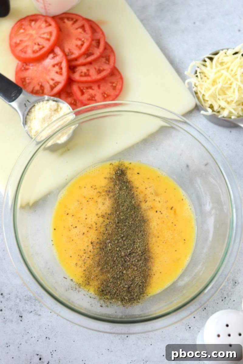 Savory Crustless Low Carb Tomato Quiche 9 Adding spices to the raw eggs