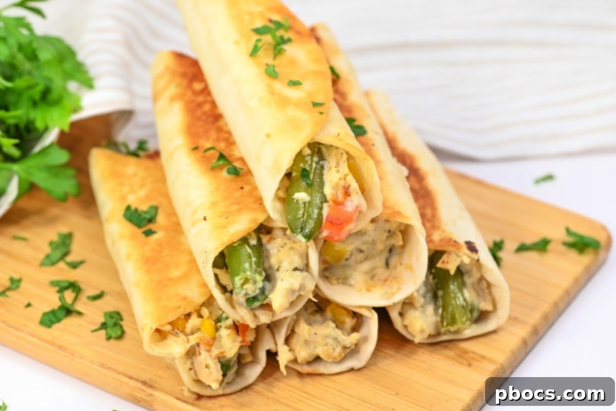 Plated crispy low-carb chicken pot pie roll-ups, ready to be served.