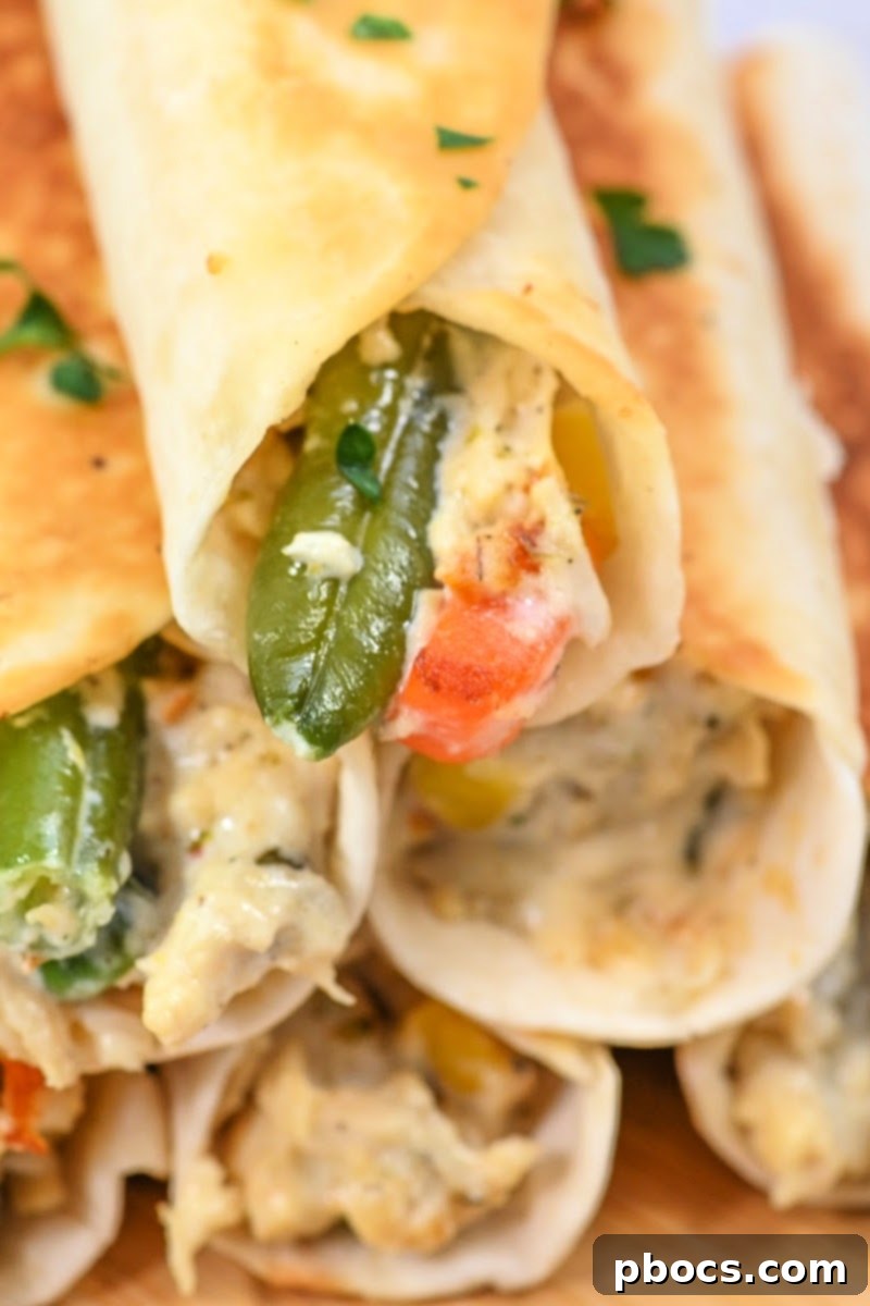 Freshly cooked and shredded chicken with mixed vegetables for the pot pie filling.