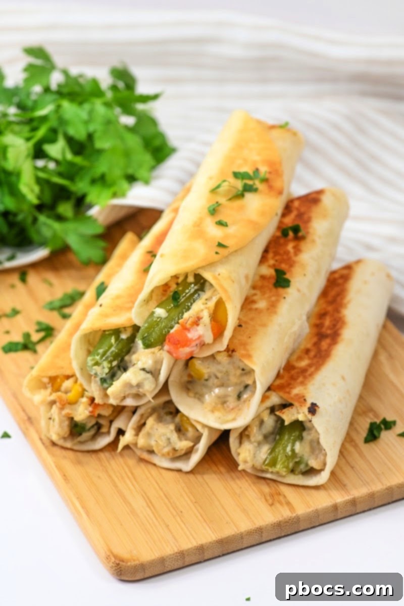 A plate of low-carb chicken pot pie roll-ups, perfect for a keto lunch.