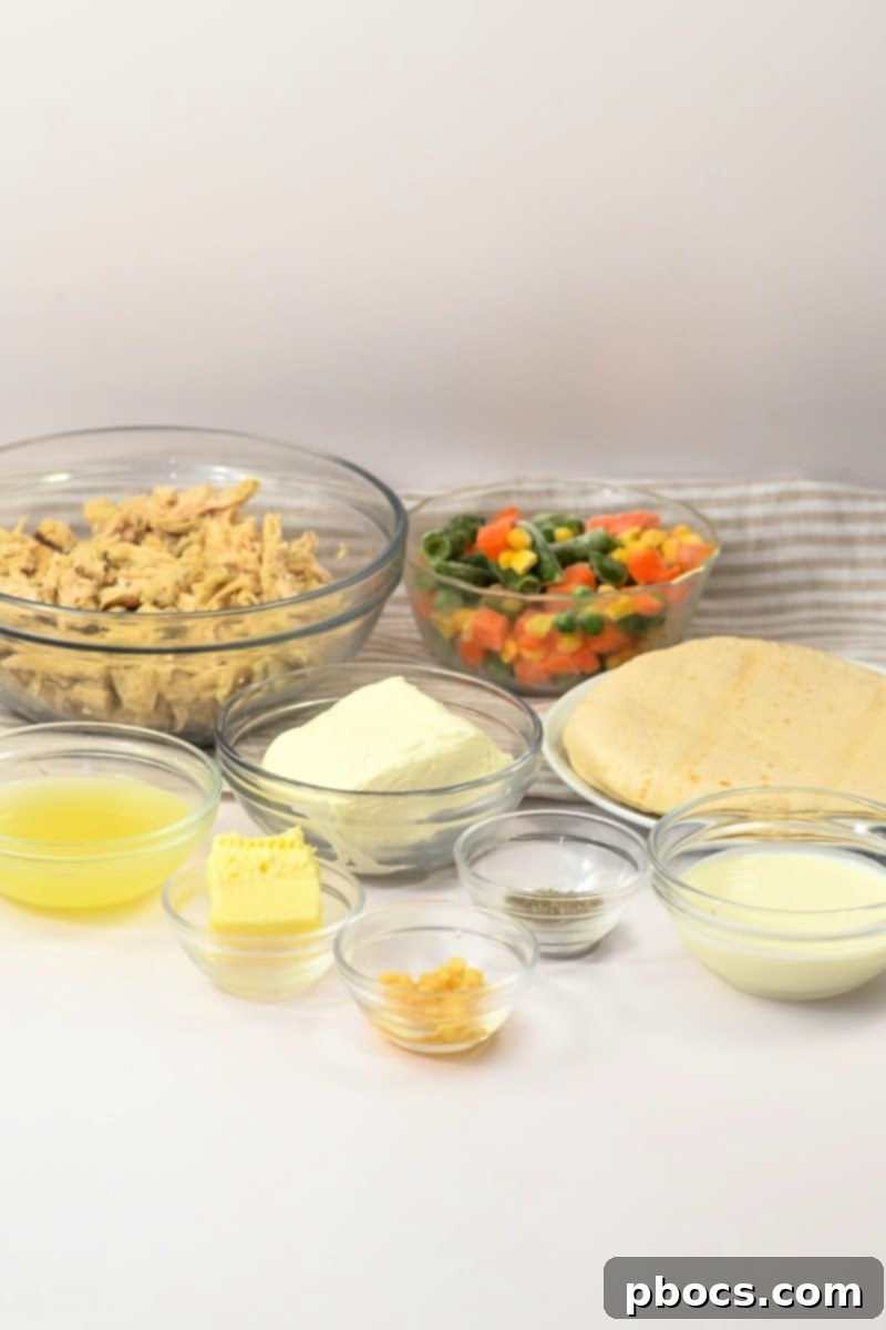 All the fresh ingredients laid out for making low-carb crispy chicken pot pie roll-ups.