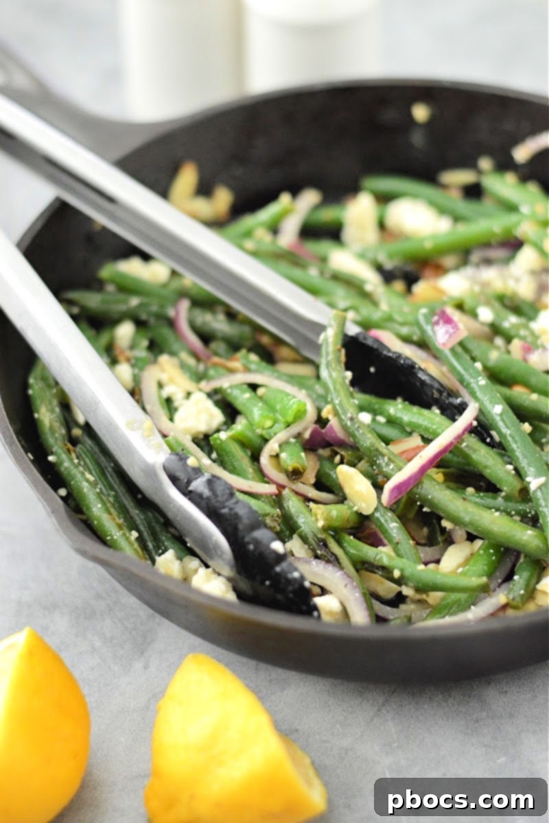 Warm Keto Green Bean Salad with Toasted Almonds 4 Green Beans with Almonds - a close-up of the salad showing the texture and ingredients