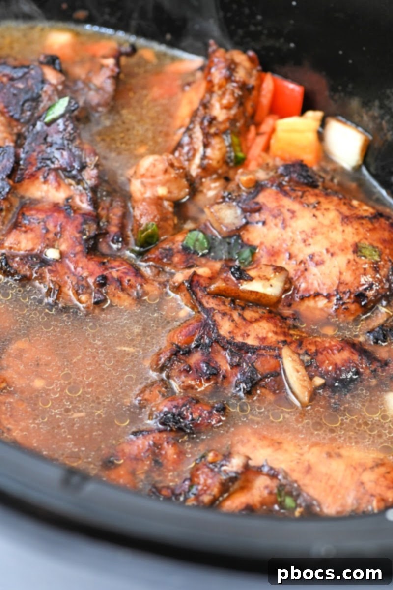 Combining vegetables and broth in a slow cooker