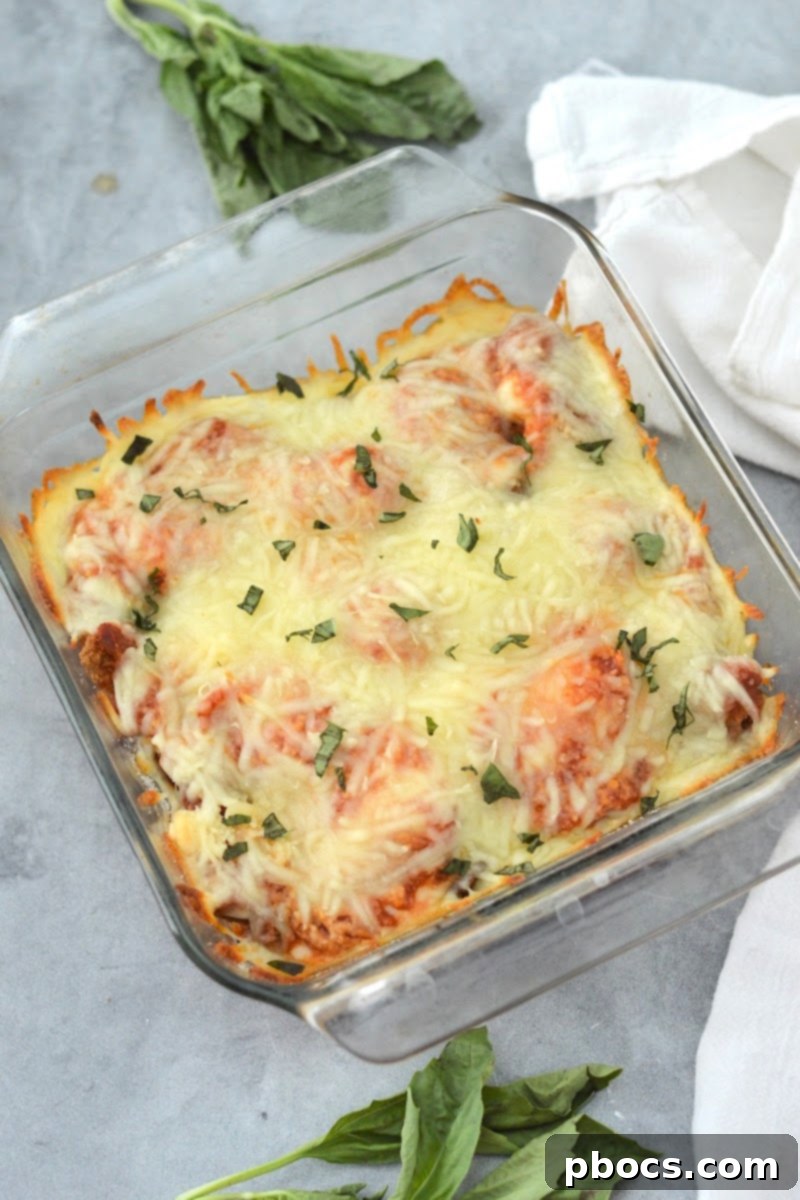 Keto Chicken Parmesan Nugget Bake 14 Baked Keto Chicken Nugget Parmesan Casserole, golden and bubbling