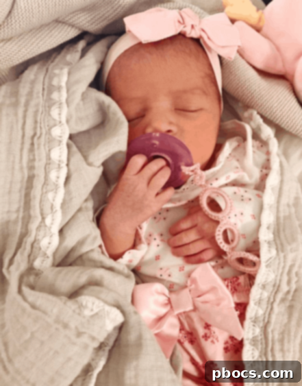 Newborn baby Lauren Mila peacefully sleeping