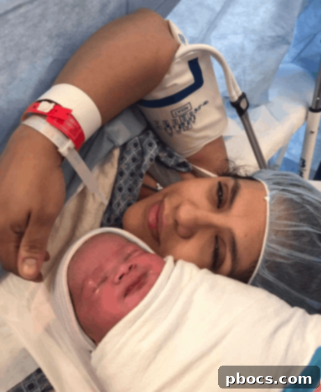 Lauren Mila's Birth Story - baby wrapped in blanket