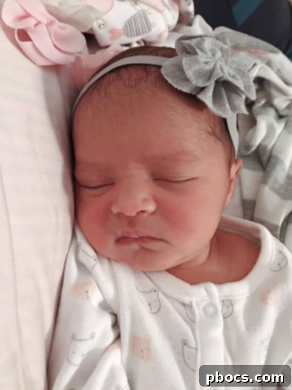 Mother holding newborn Lauren Mila