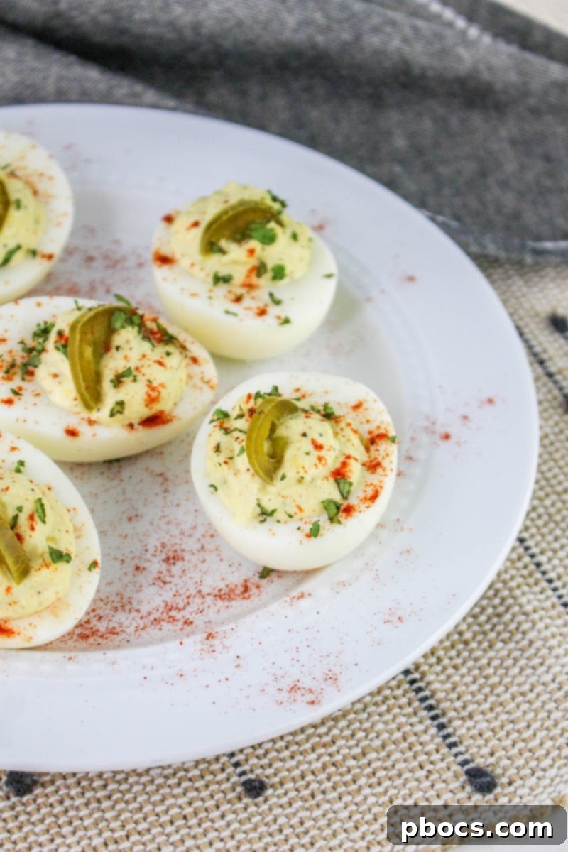 Stored Keto Jalapeno Deviled Eggs in an airtight container