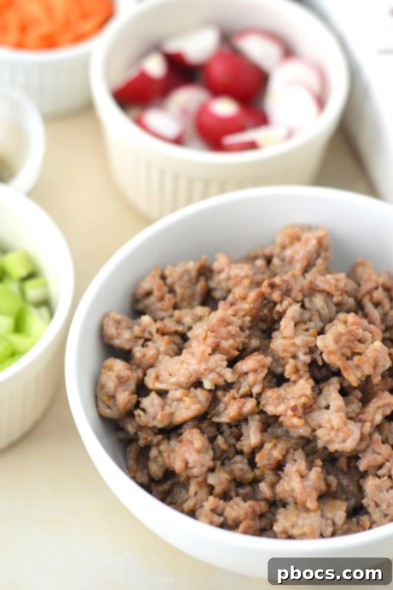 Cooked Italian sausage in a bowl, drained of grease