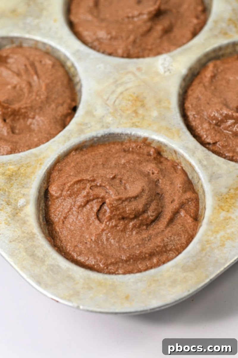 Baking the chocolate cupcakes for ding dongs