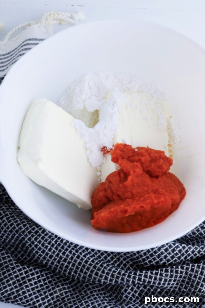 Low-Carb Turtle Pumpkin Cheesecake Bars - Blending filling