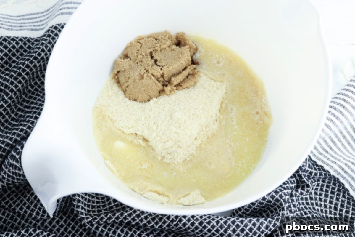 Low-Carb Turtle Pumpkin Cheesecake Bars - Mixing crust