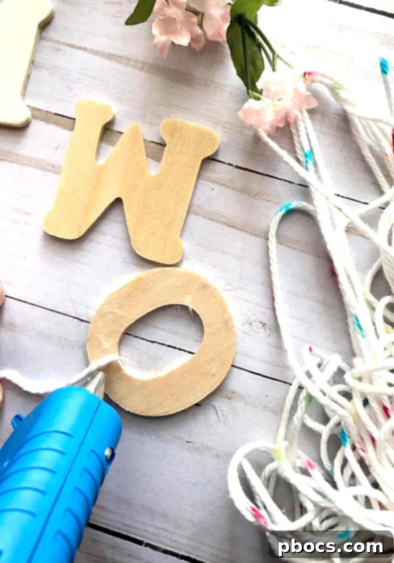 Continuous yarn wrapping technique for wooden letters