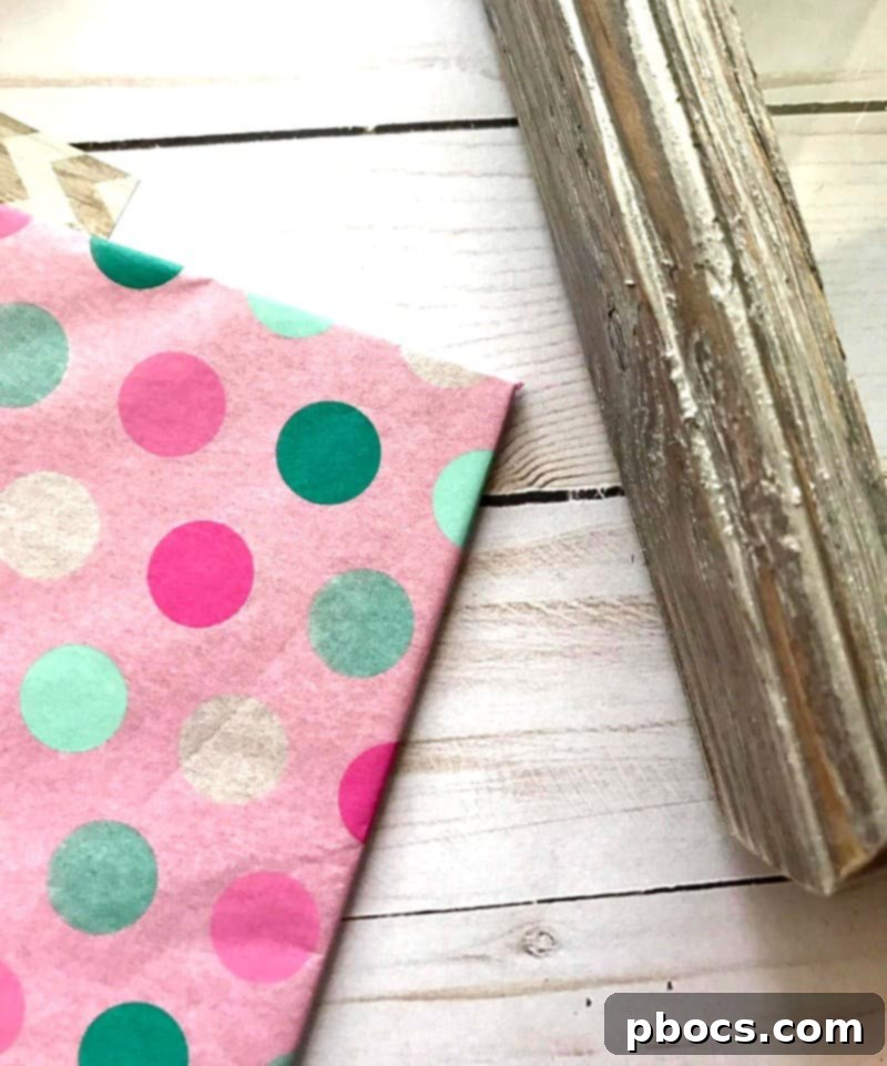 Decorating the shadow box background with beautiful tissue paper