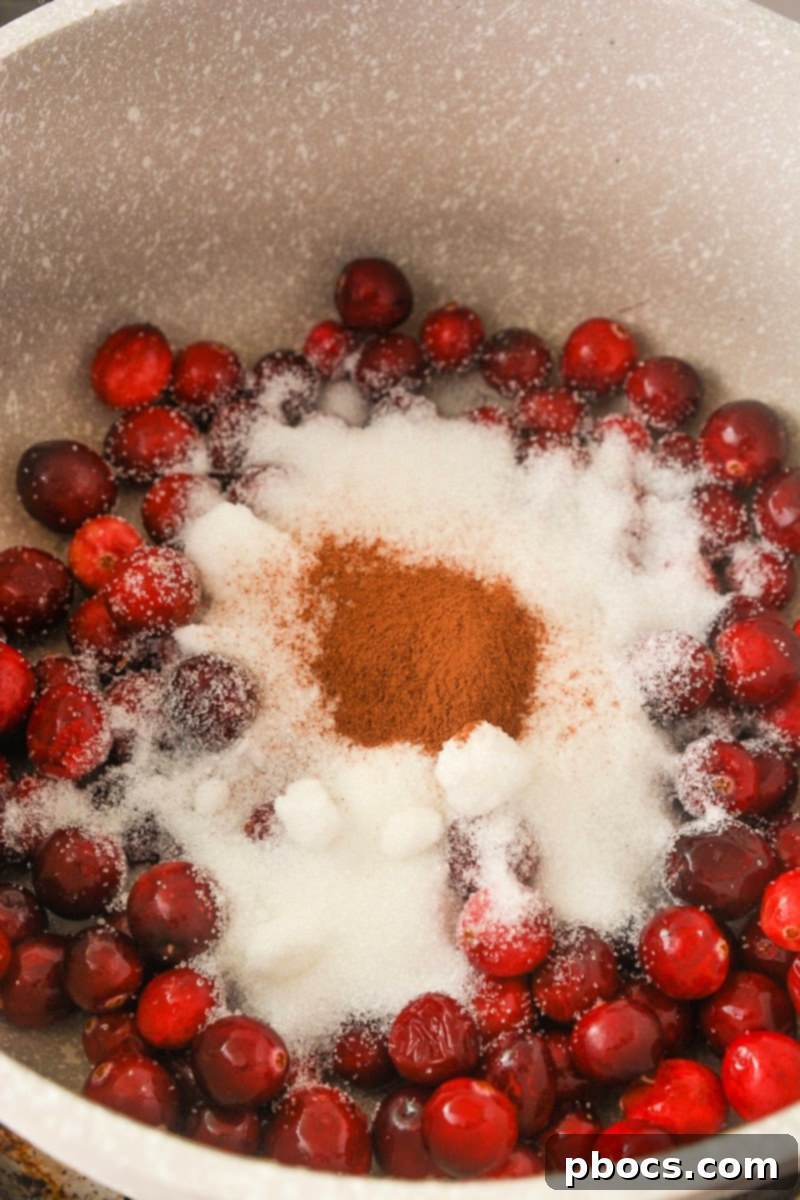 Adding sweetener to the cranberries