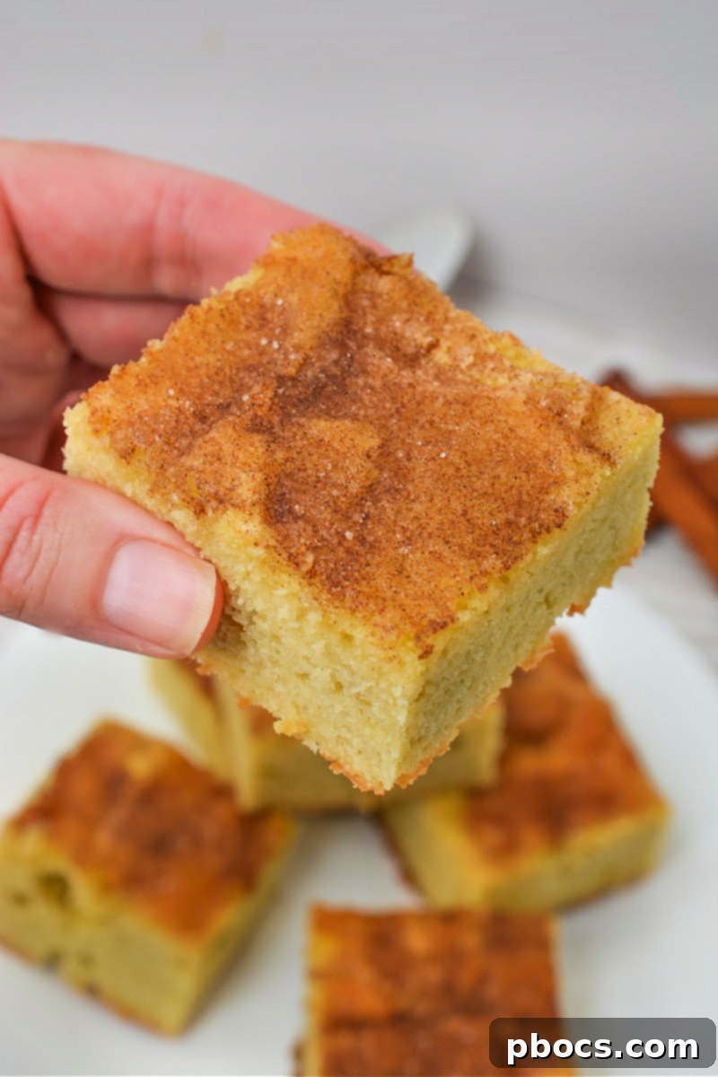 Preparing the batter for Keto Snickerdoodle Bars in a mixing bowl.