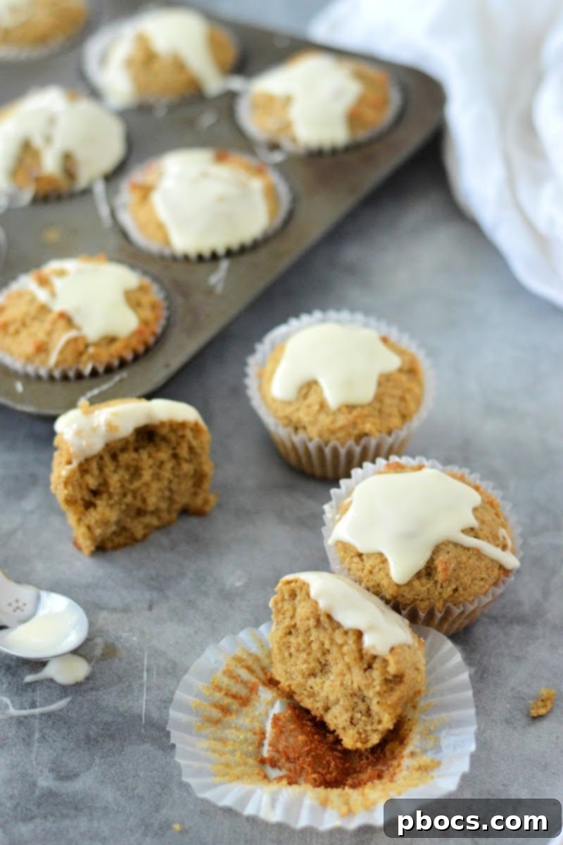 Spiced Keto Gingerbread Muffins with Creamy Icing 5 Finished Keto Gingerbread Muffins with Eggnog Glaze Drizzle