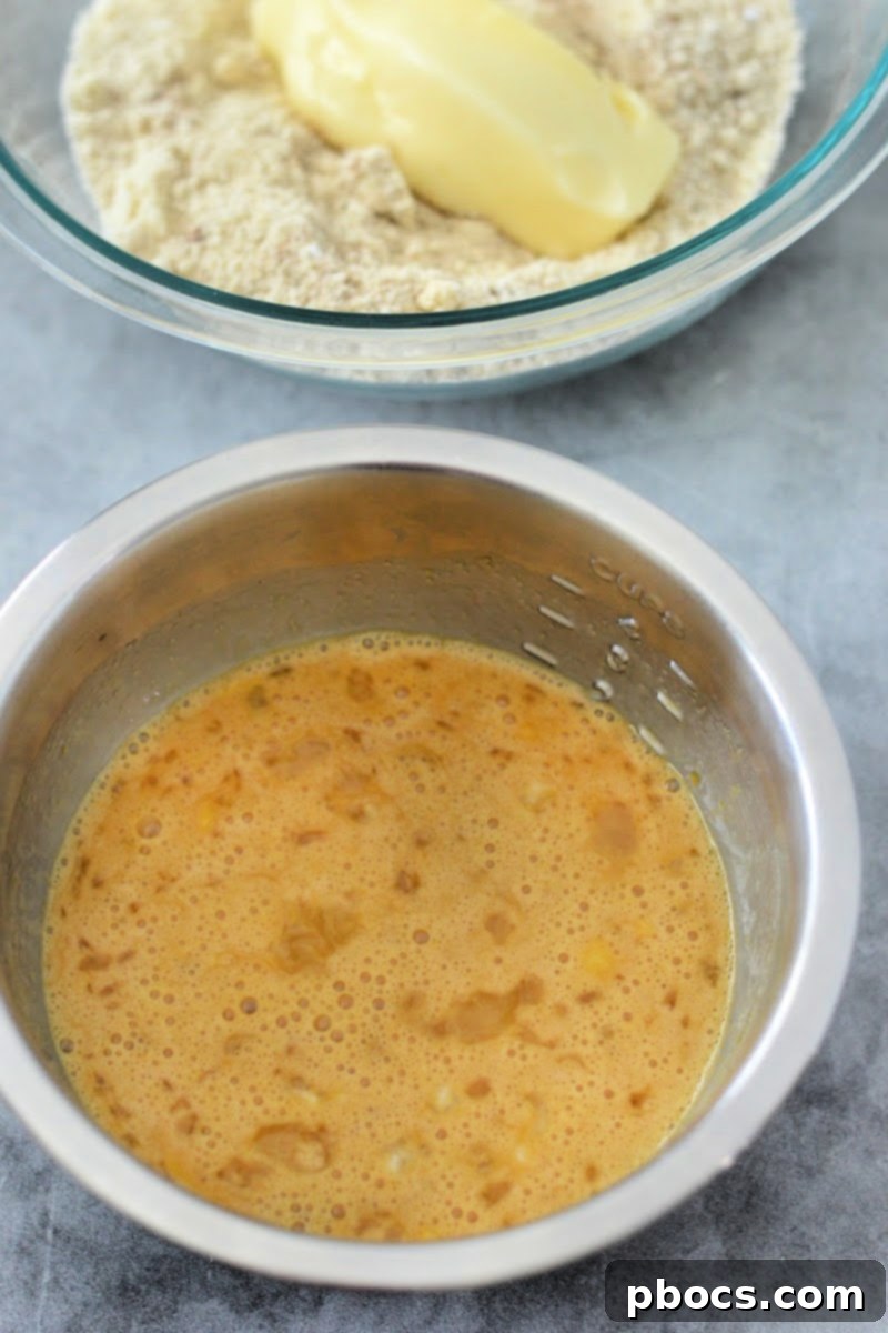 Spiced Keto Gingerbread Muffins with Creamy Icing 10 Adding softened butter to flour mixture