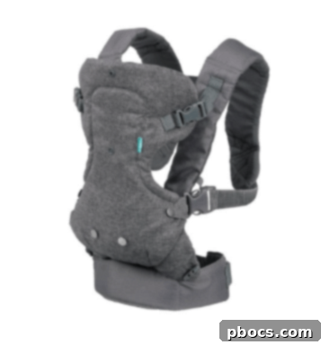 My Babywearing Love Story and Top Carriers 4 A mother wearing her baby in an Infantino carrier, highlighting its practicality.