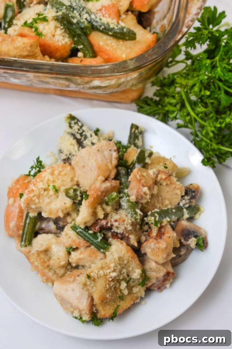 Scoop of Low Carb Green Bean Stuffing Casserole from a baking dish