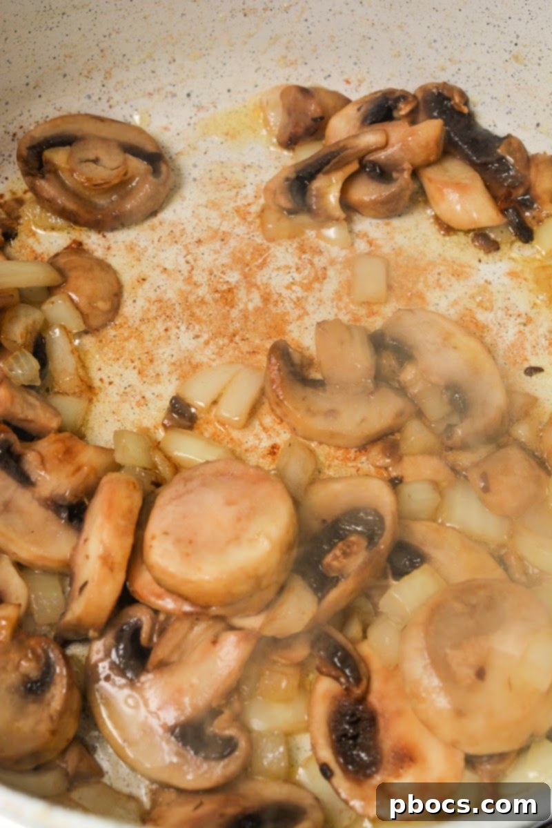 Sautéing mushrooms and onions for the casserole base
