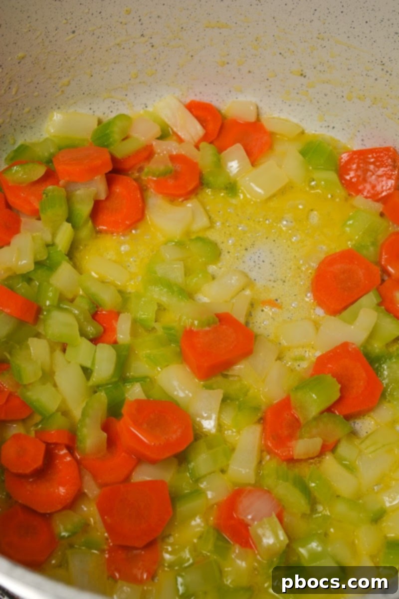 Cooking the celery, carrots, and onions