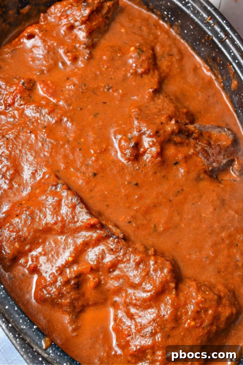 Savory Keto Birria Beef Tacos 15 Pureeing Birria Sauce with Immersion Blender