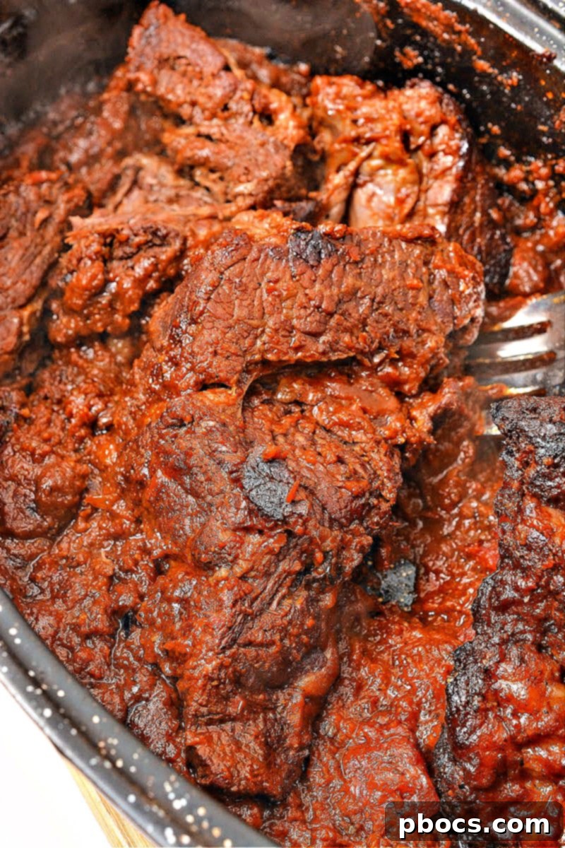 Savory Keto Birria Beef Tacos 16 Birria Beef Braising in Sauce