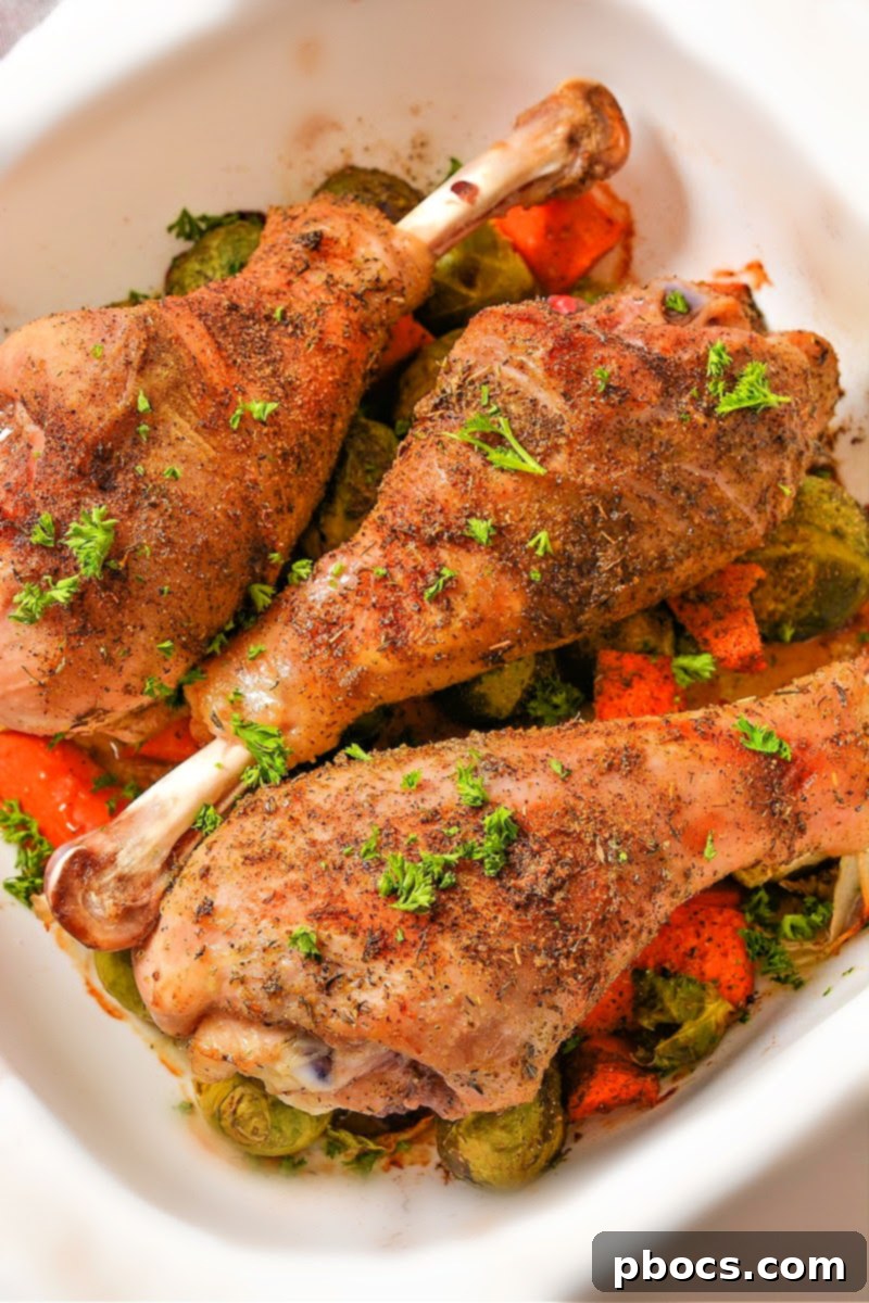 Low-Carb Slow Roasted Turkey Legs in baking dish with vegetables