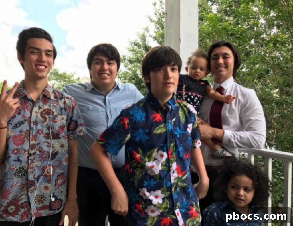 A candid moment during graduation festivities, capturing family happiness.