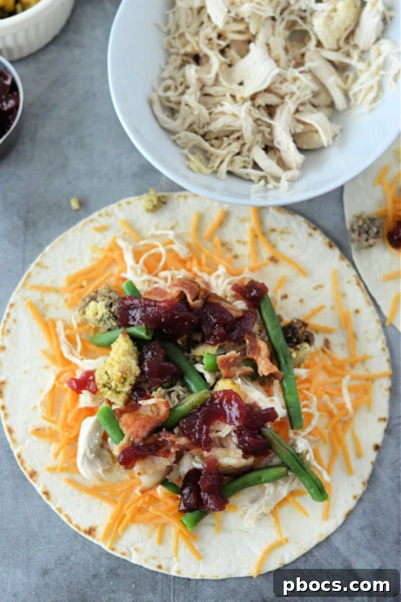 Festive Keto Crunchwrap Delight 11 Assembling all the holiday ingredients into the tortilla before folding.