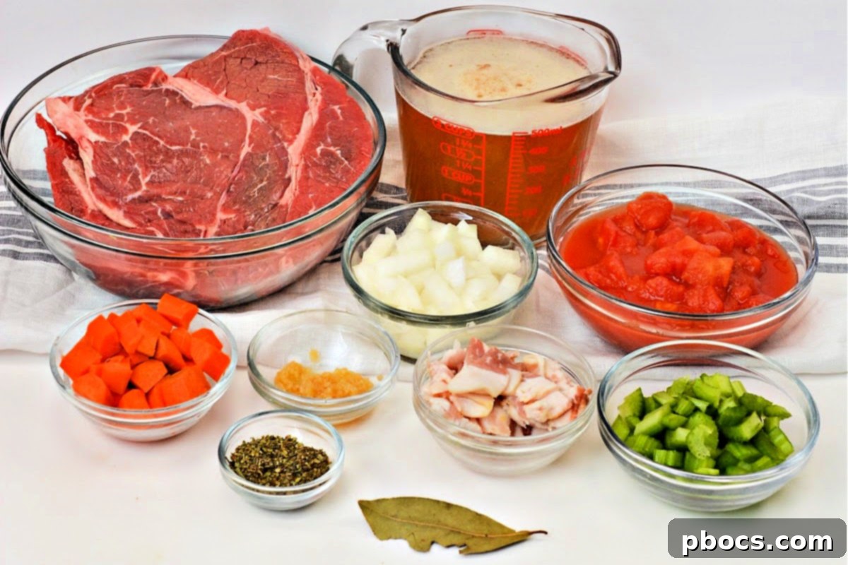 Keto Tuscan Pot Roast 11 Adding diced tomatoes, bay leaf, and broth to pot