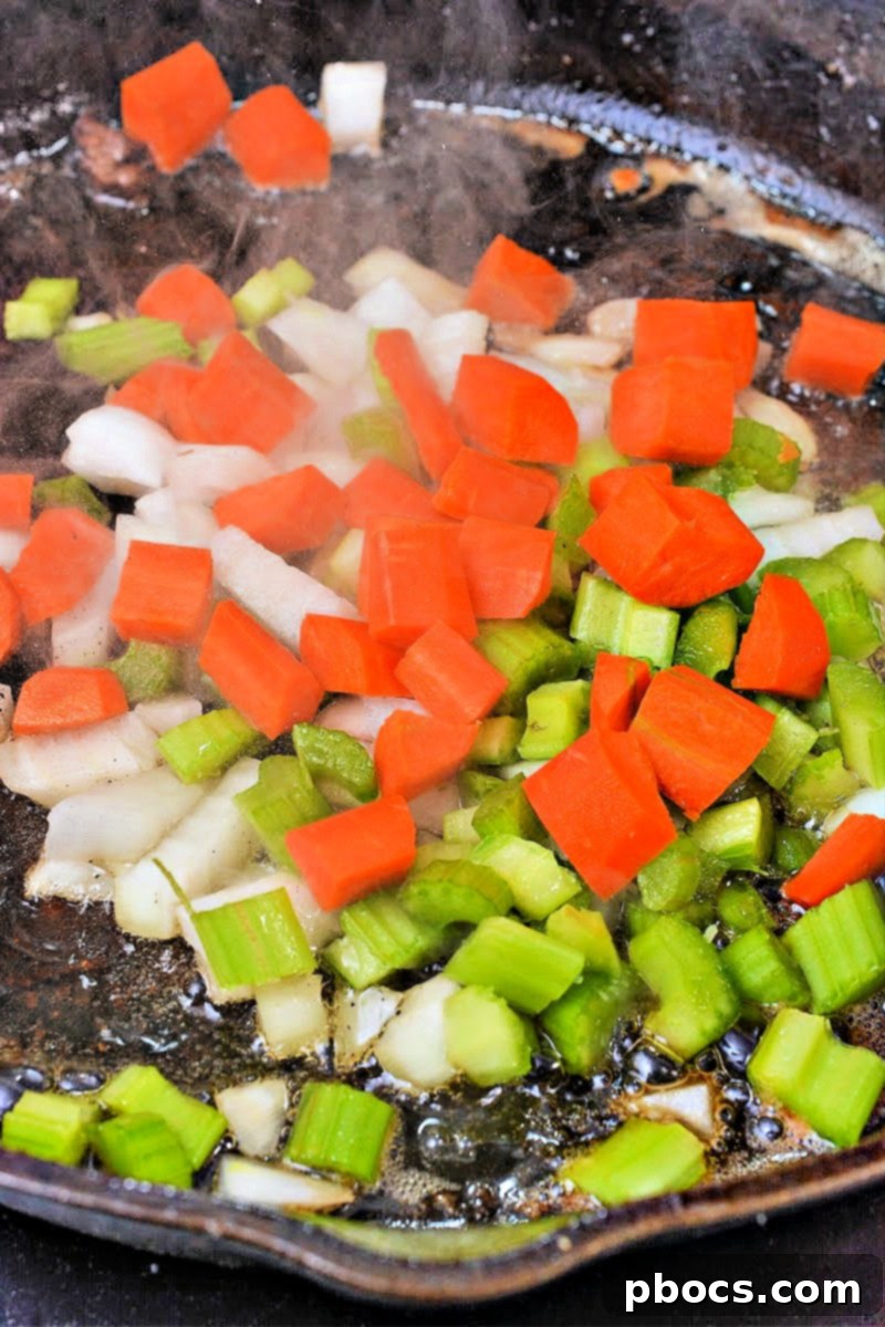 Keto Tuscan Pot Roast 9 Sautéing onions, carrots, and celery for pot roast