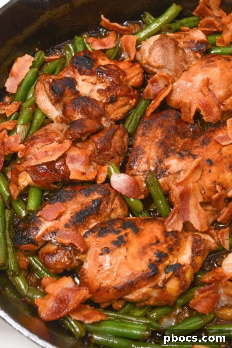 One-Pan Low-Carb Crack Chicken with Green Beans 3 Close-up of Asian-style green beans in a skillet, coated in sauce