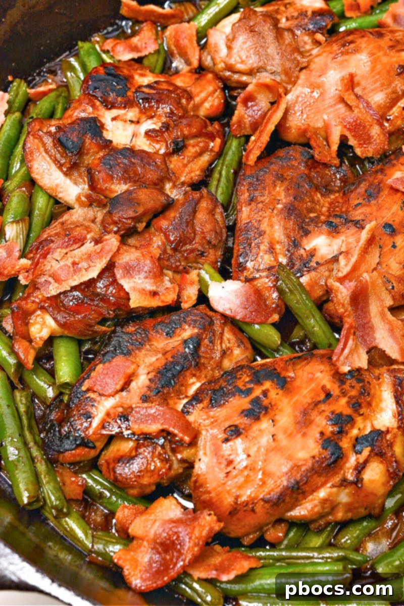 One-Pan Low-Carb Crack Chicken with Green Beans 5 Marinated chicken thighs and fresh green beans in a skillet