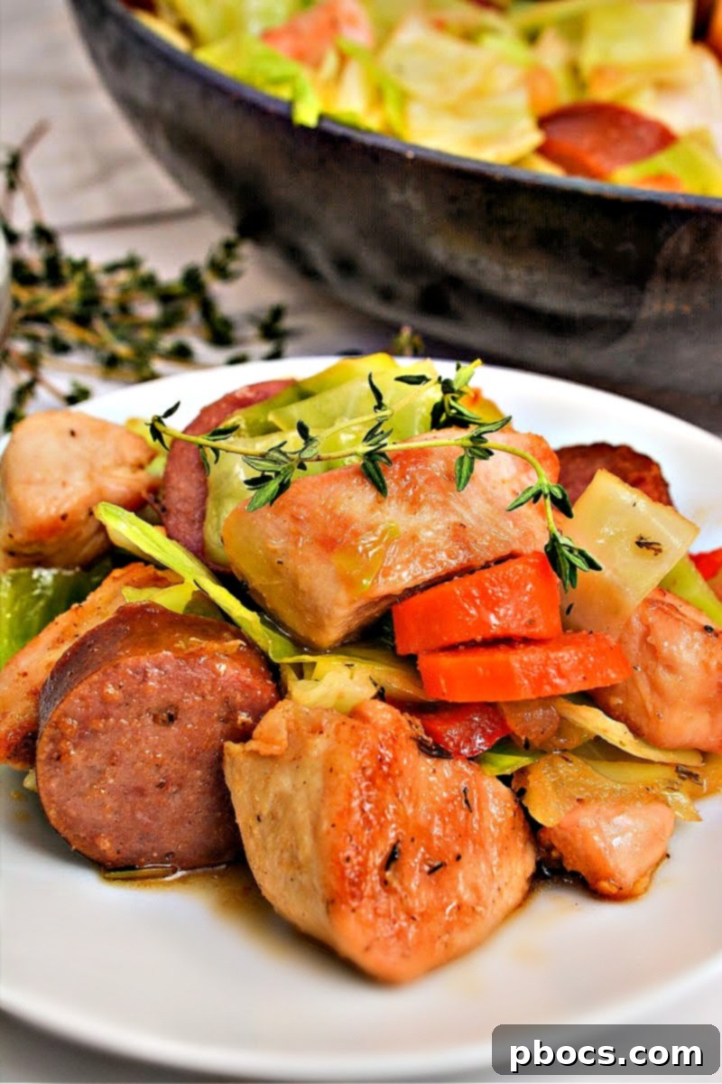 Sticky Honey Garlic Keto Skillet Chicken and Sausage 7 Stack of meal prep containers with Keto Skillet Honey Garlic Sausage and Chicken