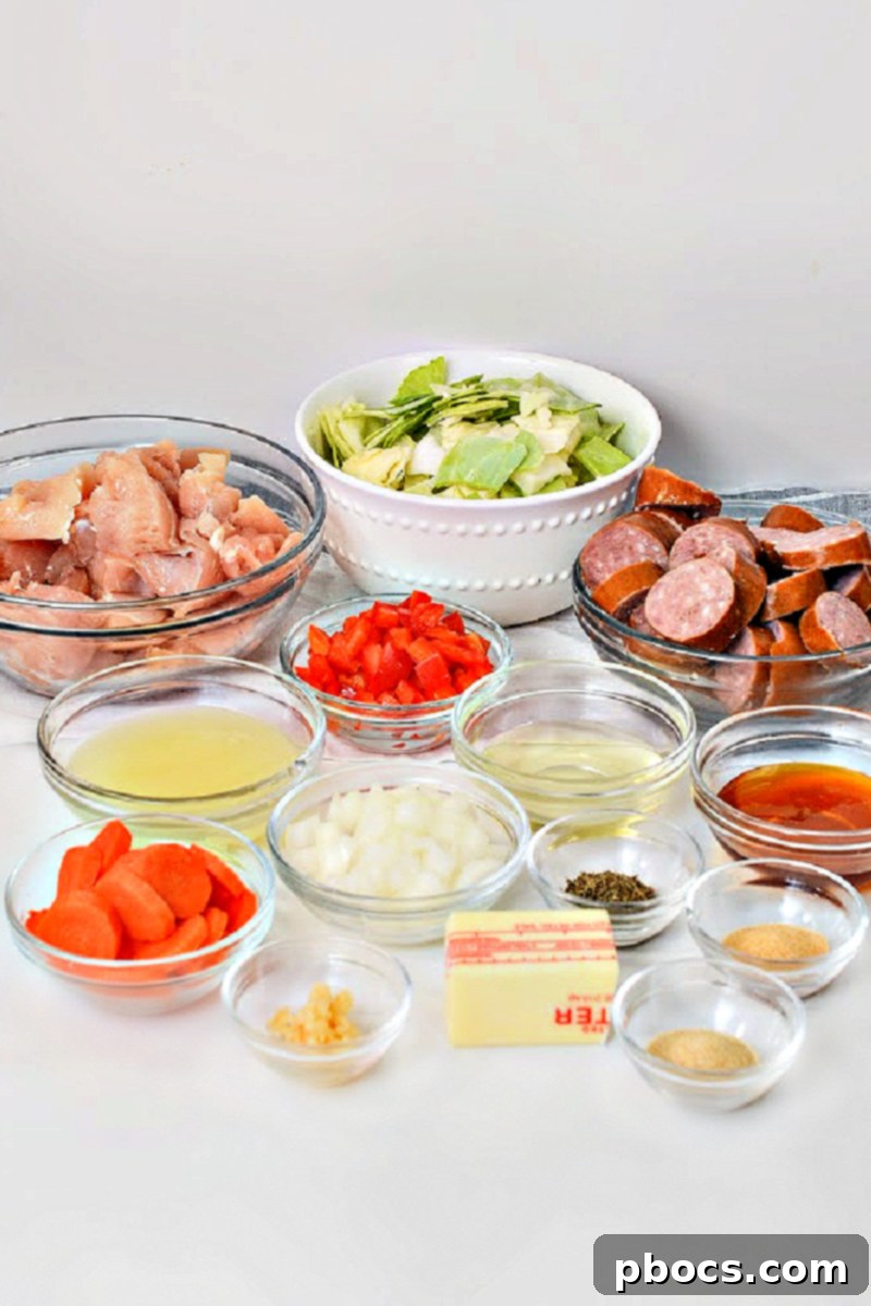 Chicken pieces seasoned with spices in a bowl for Keto Skillet Honey Garlic Sausage and Chicken