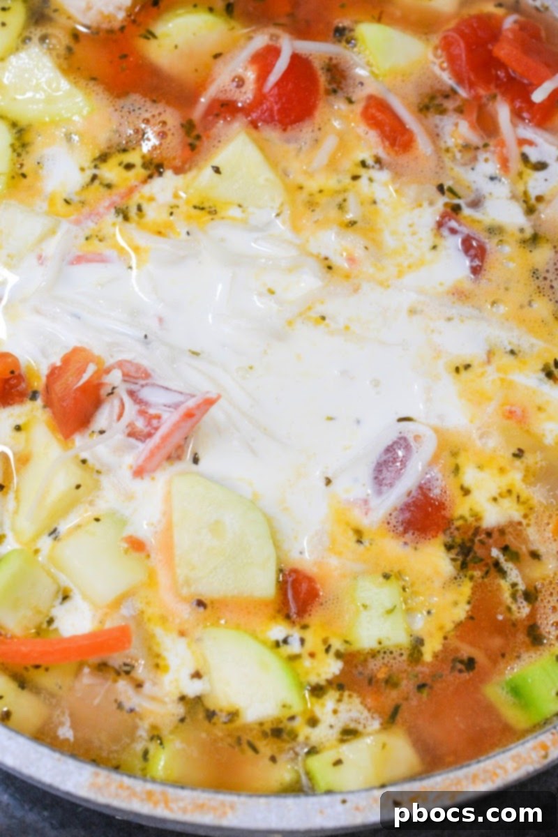 Low-Carb Italian Zucchini Bliss 10 Creamy Italian zucchini soup simmering on the stovetop.