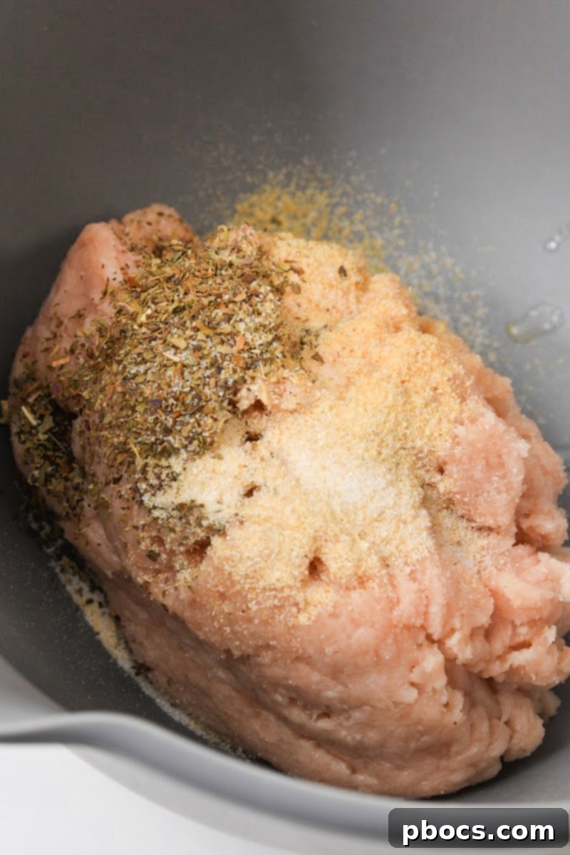 Keto Cheesy Ranch Chicken Pockets 9 Mixing the ground chicken mixture with onion powder, garlic powder, Italian seasoning, and salt and pepper in a bowl