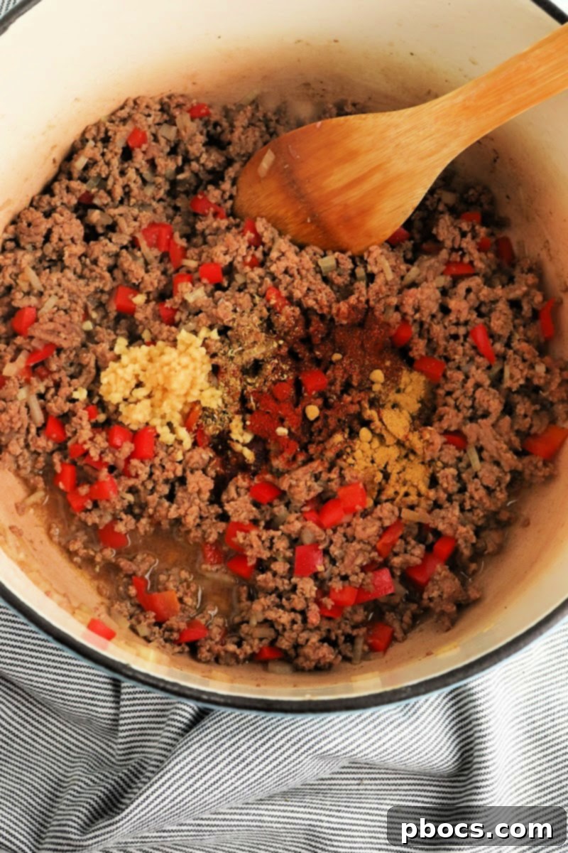 Adding garlic and spices