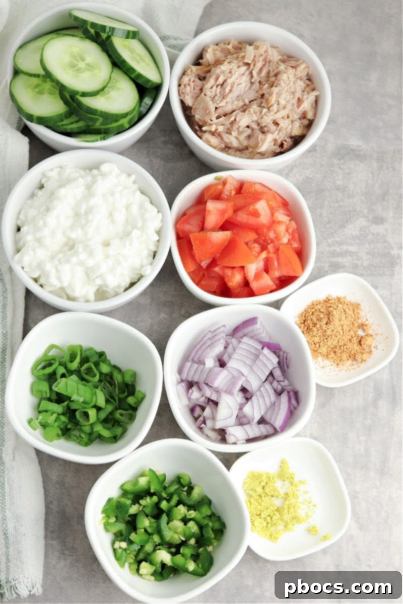 Keto Mexican Tuna Cucumber Salad Ingredients in different bowls