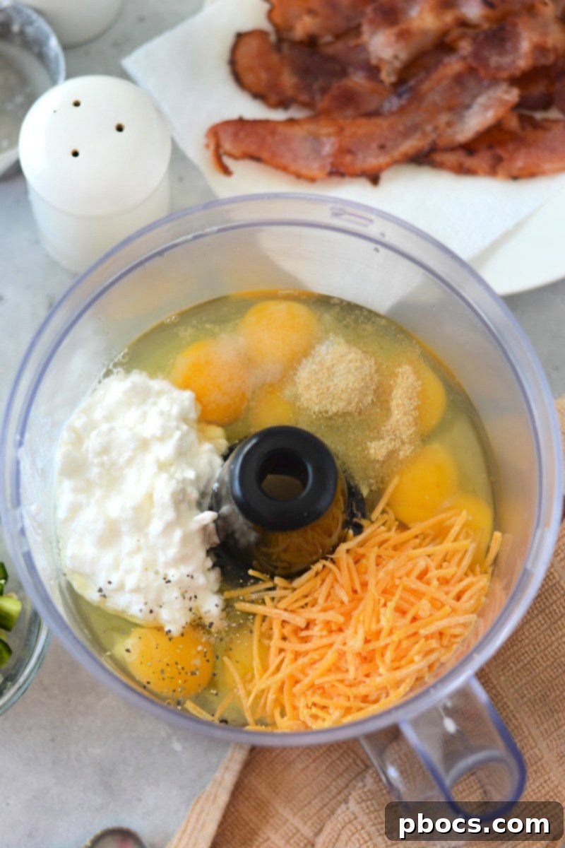 Silicone muffin liners used for easy removal of Keto Jalapeno Popper Egg Bites.