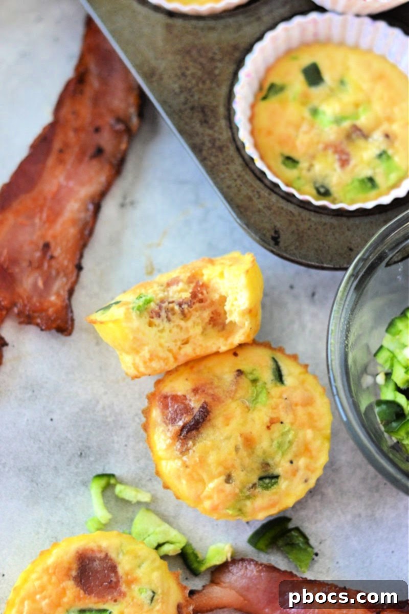 Spicy Keto Jalapeno Popper Egg Bites, showing optional cheese topping.