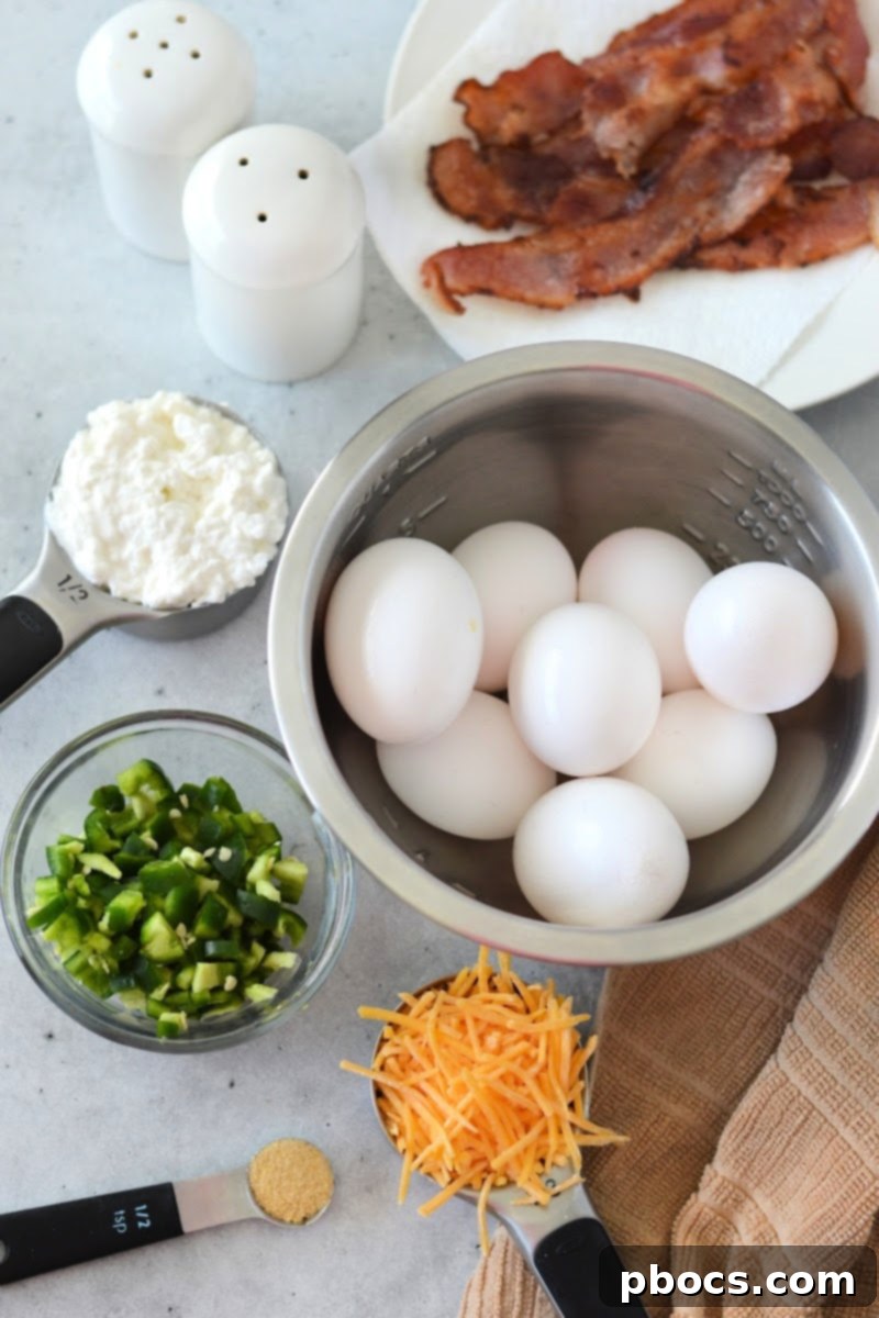 Ingredients laid out for Keto Jalapeno Popper Egg Bites recipe.