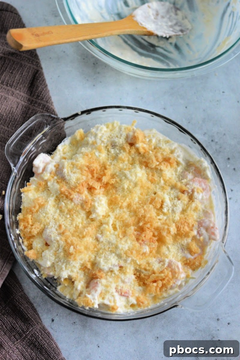 Baked Keto Shrimp Scampi Dip garnished and ready to serve