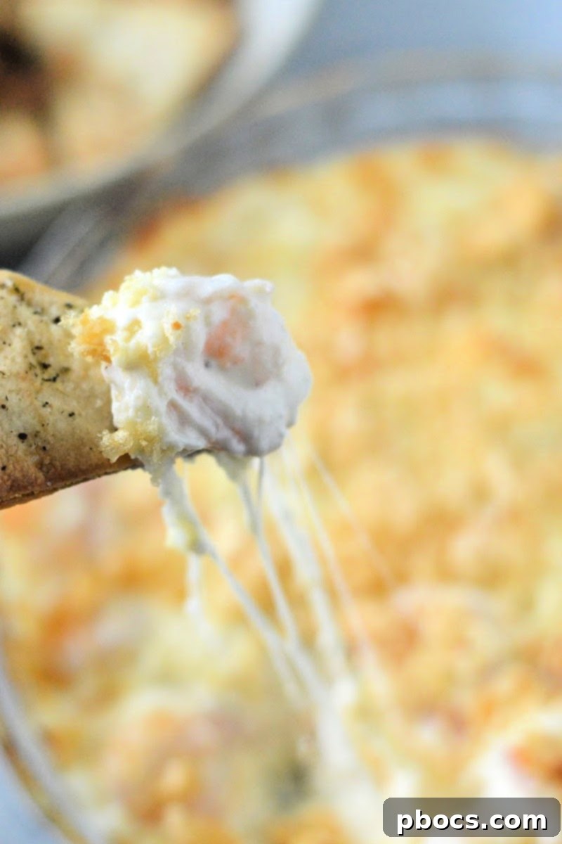 Keto Shrimp Scampi Dip with various keto dippers, including cucumber slices