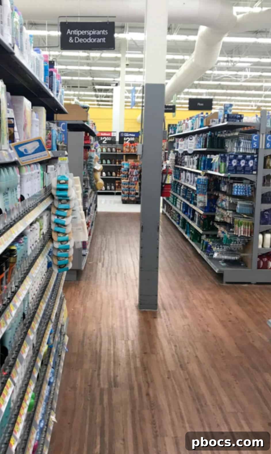 A tastefully arranged collection of beach day items, including a stylish wide-brimmed hat and a relaxing book