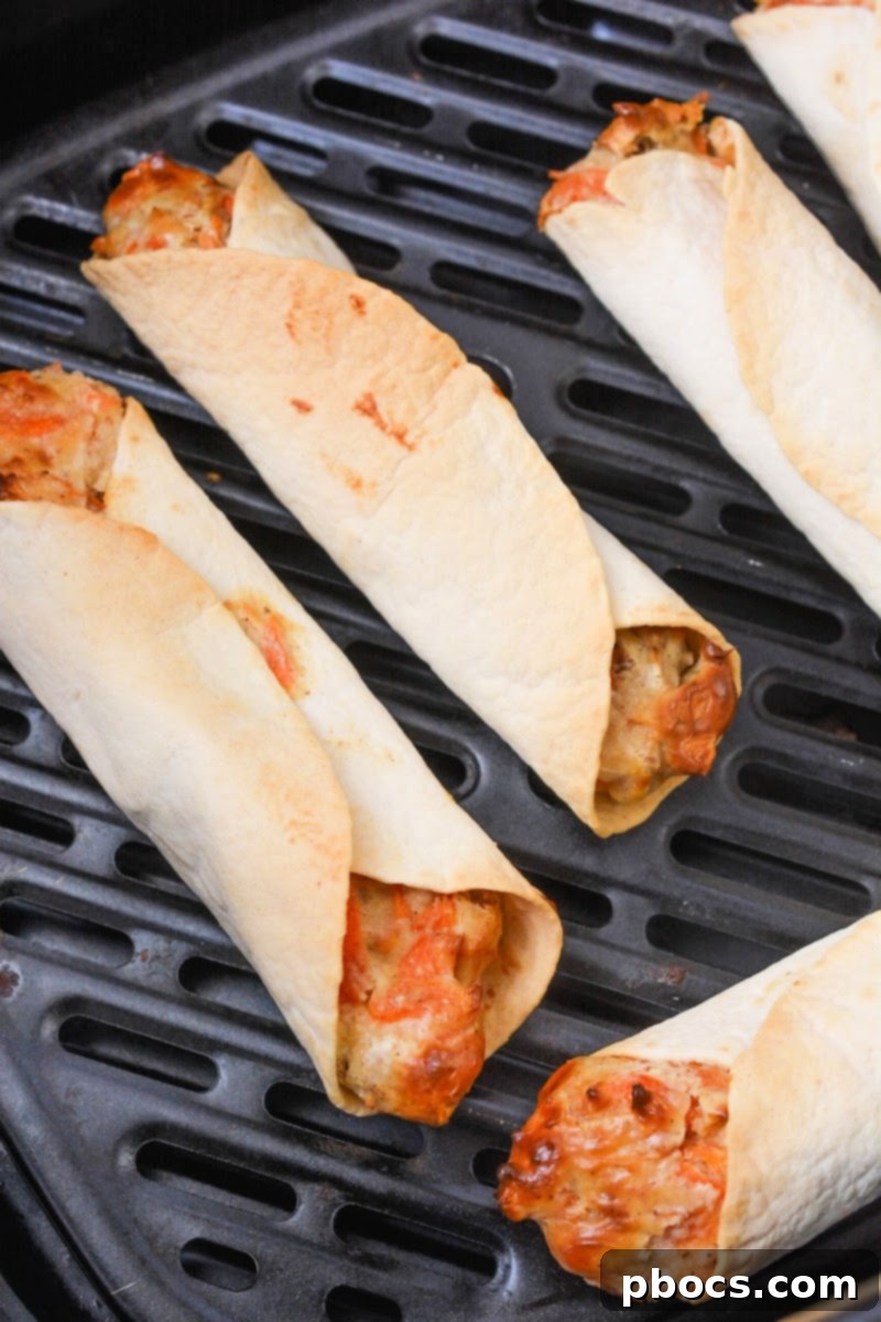 Keto Carrot Cake Swirls 12 Keto Carrot Cake Roll-Ups in an air fryer tray