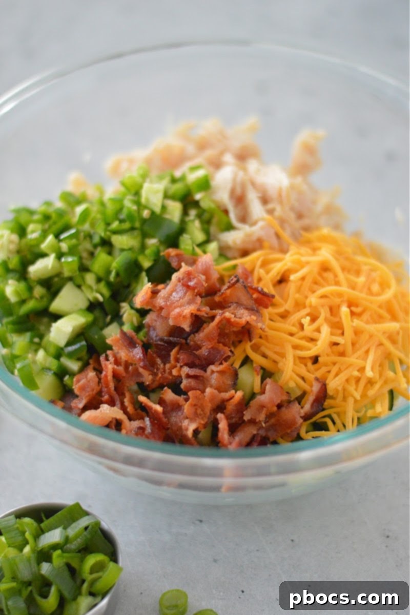 Mixing all salad ingredients in a bowl