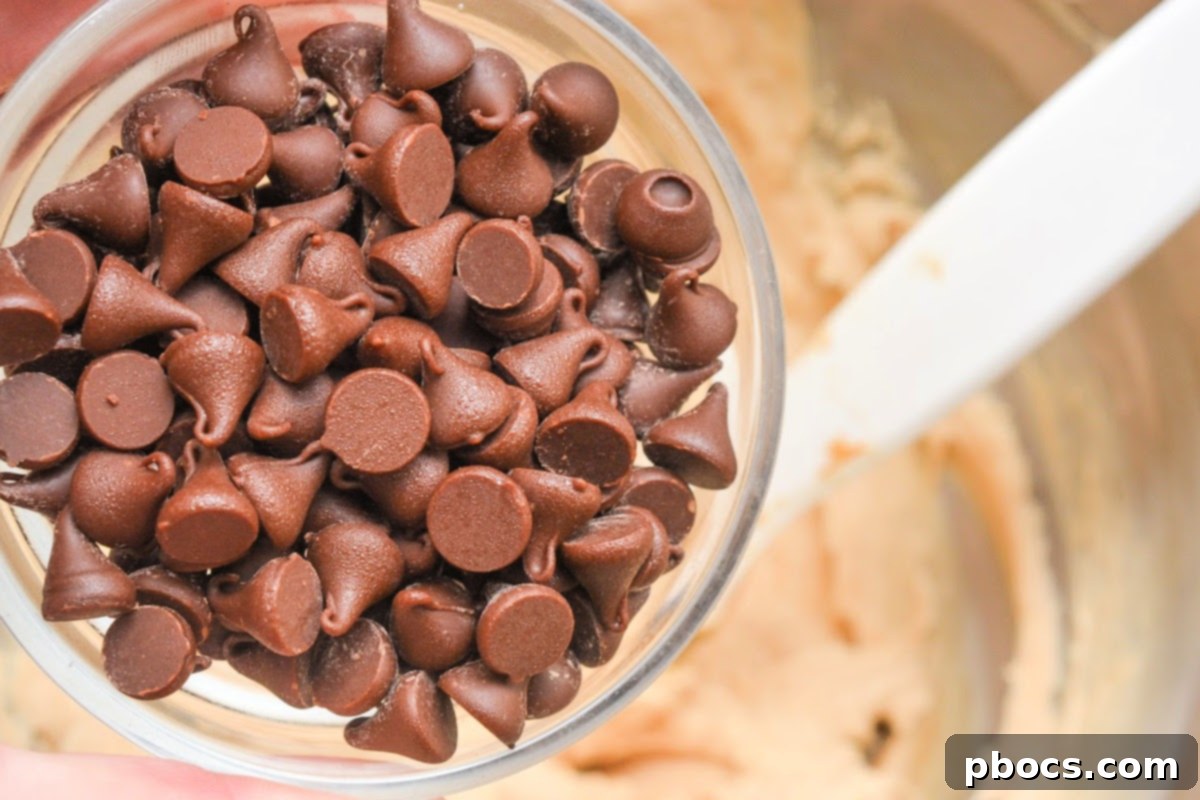 Adding Keto Chocolate Chips to the peanut butter filling